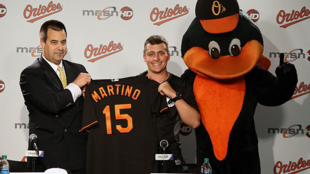 Baltimore Orioles' General Manager Dan Duquette with Jimmy Martino.