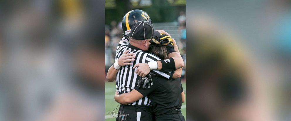 PHOTO: Back from Kuwait, Master Sgt. Joe Egersheim surprised his 17-year-old twins at a Jonathan Law High School football game in Milford, Conn. 