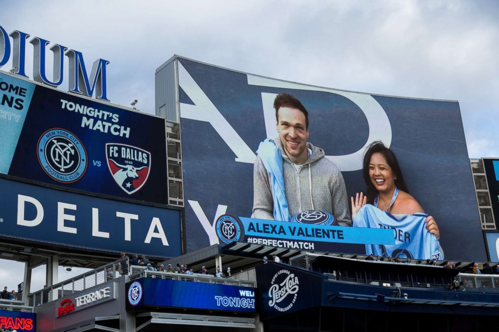 PHOTO: Alexa Valiente and her Tinder date Walter appear on the Jumbotron at Yankee Stadium before the NYCFC game on April 29, 2018.