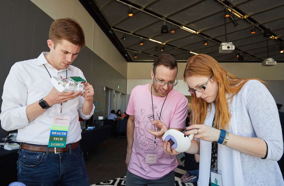 PHOTO: A participant uses the sewing station at the 2018 Make the Breast Pump Not Suck Hackathon at MIT.