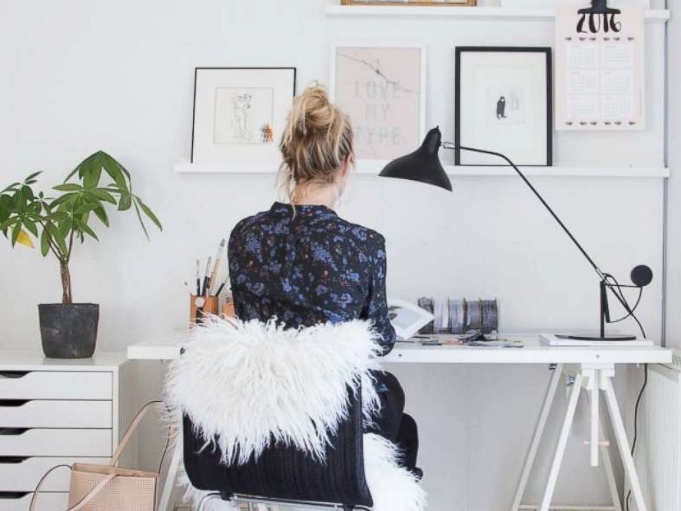 PHOTO: Niki Brantmark sits at her desk in her home in Sweden.