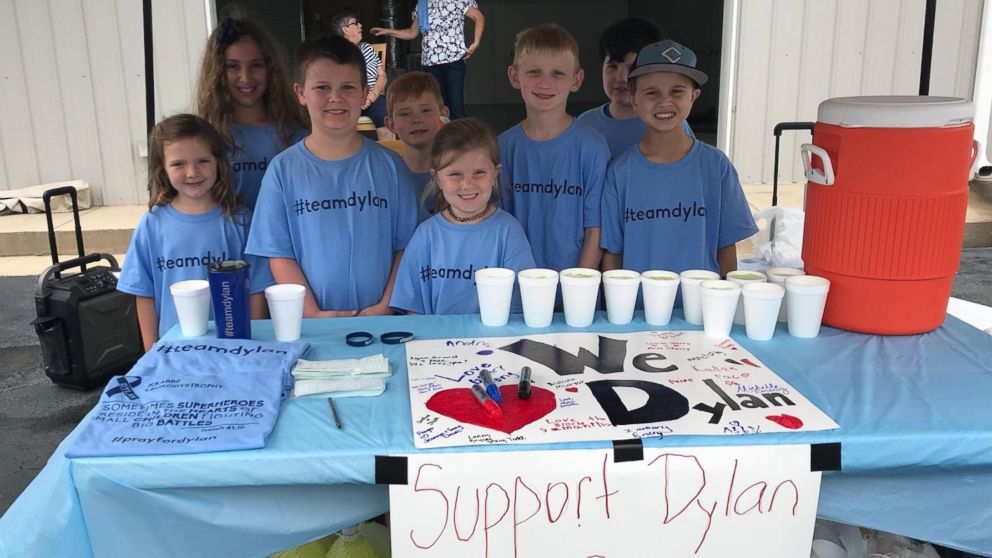 PHOTO: Matt Emery and Melissa Goldman Emery's son Andrew, 9, set up a lemonade stand to help pay for his brother Dylan's medical bills. 