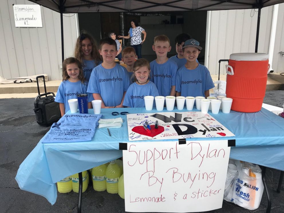 PHOTO: Matt Emery and Melissa Goldman Emery's son Andrew, 9, set up a lemonade stand to help pay for his brother Dylan's medical bills. 