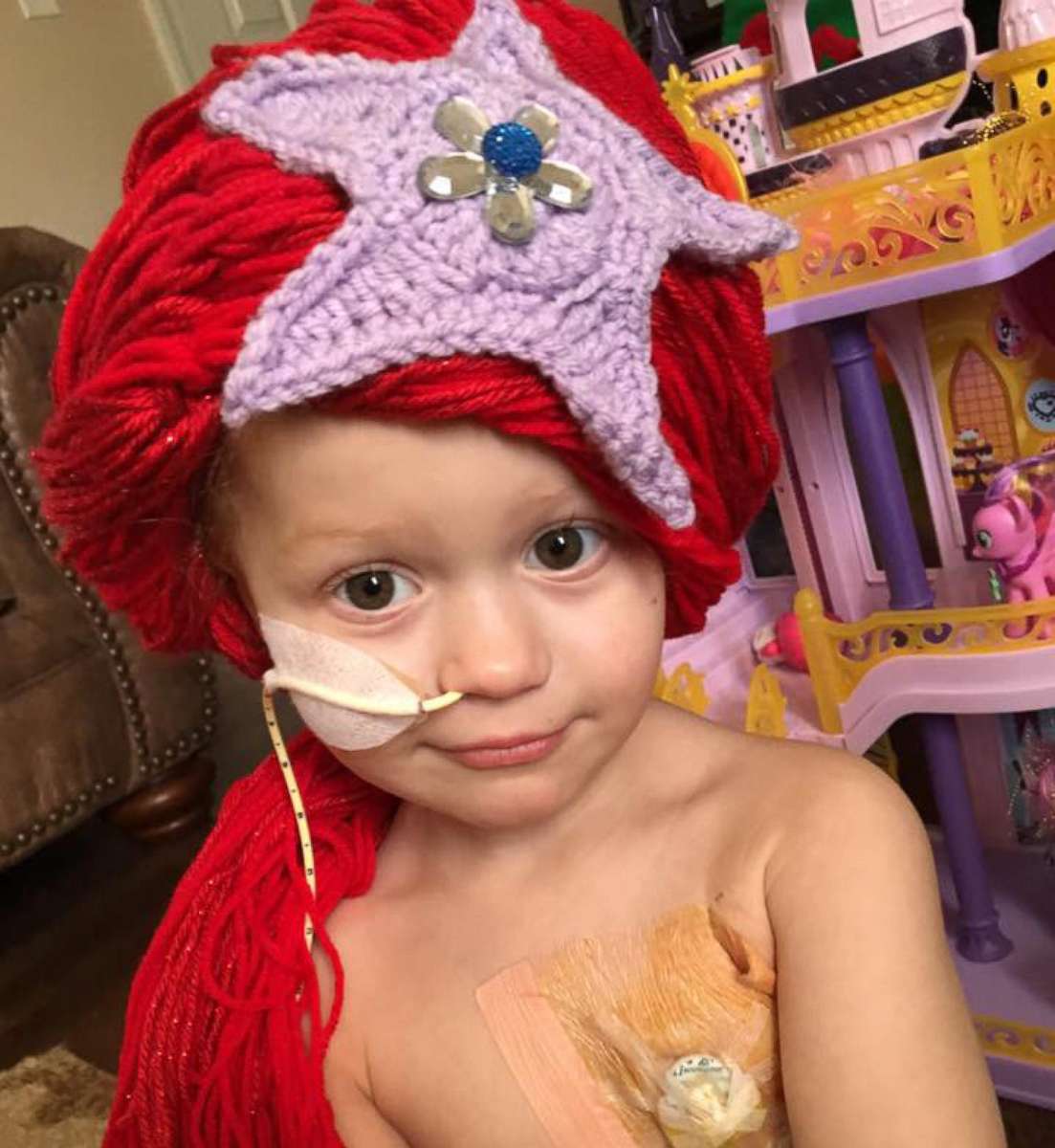 PHOTO: Magic Yarn Project creates homespun wigs for little cancer fighters.