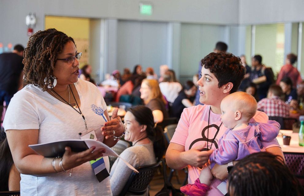 PHOTO: Participants discuss breastfeeding at the 2018 Make the Breast Pump Not Suck Hackathon at MIT.