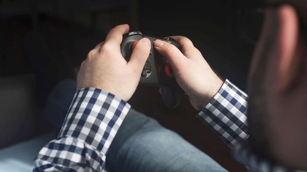 A man plays a video game in an undated stock photo.