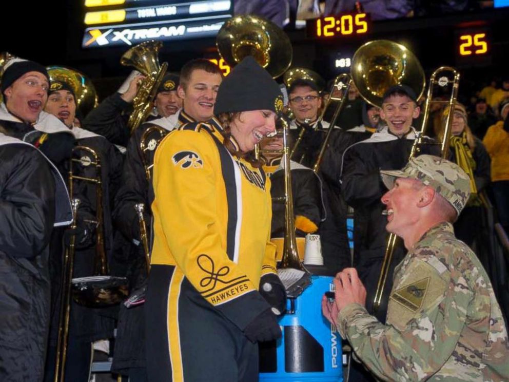 PHOTO: Isaac Anderson surprised his longtime girlfriend, Grace Schebler, during her marching band performance at the University of Iowa football game on Oct. 28, 2017.