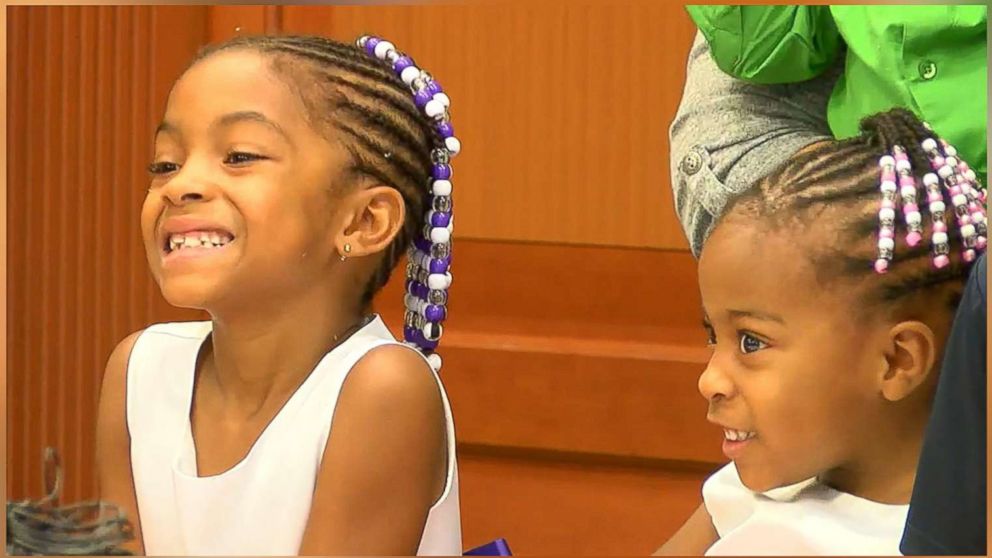PHOTO:Sisters Marianna, 6, and Keyora, 3, July 27, 2017, at their adoption ceremony at Judge Ralph Winkler's courtroom at Hamilton County Probate Court in Cincinnati.