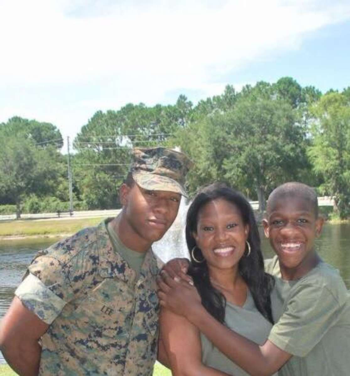 PHOTO: Rekita Lee smiles alongside her two sons, Tre'Vaughn and Kordell Lee.