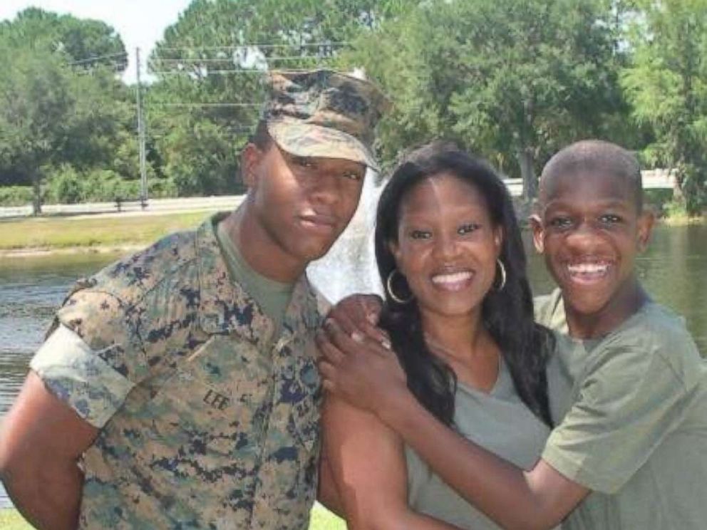 PHOTO: Rekita Lee smiles alongside her two sons, TreVaughn and Kordell Lee.