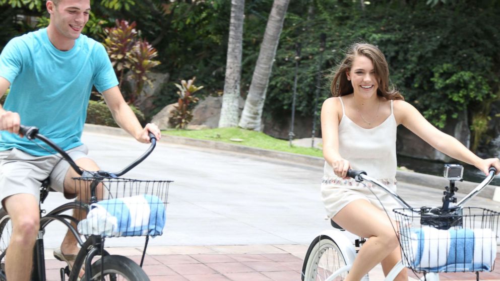 PHOTO: Josh and Michelle bike riding on their date at the Grand Wailea Resort in Maui.