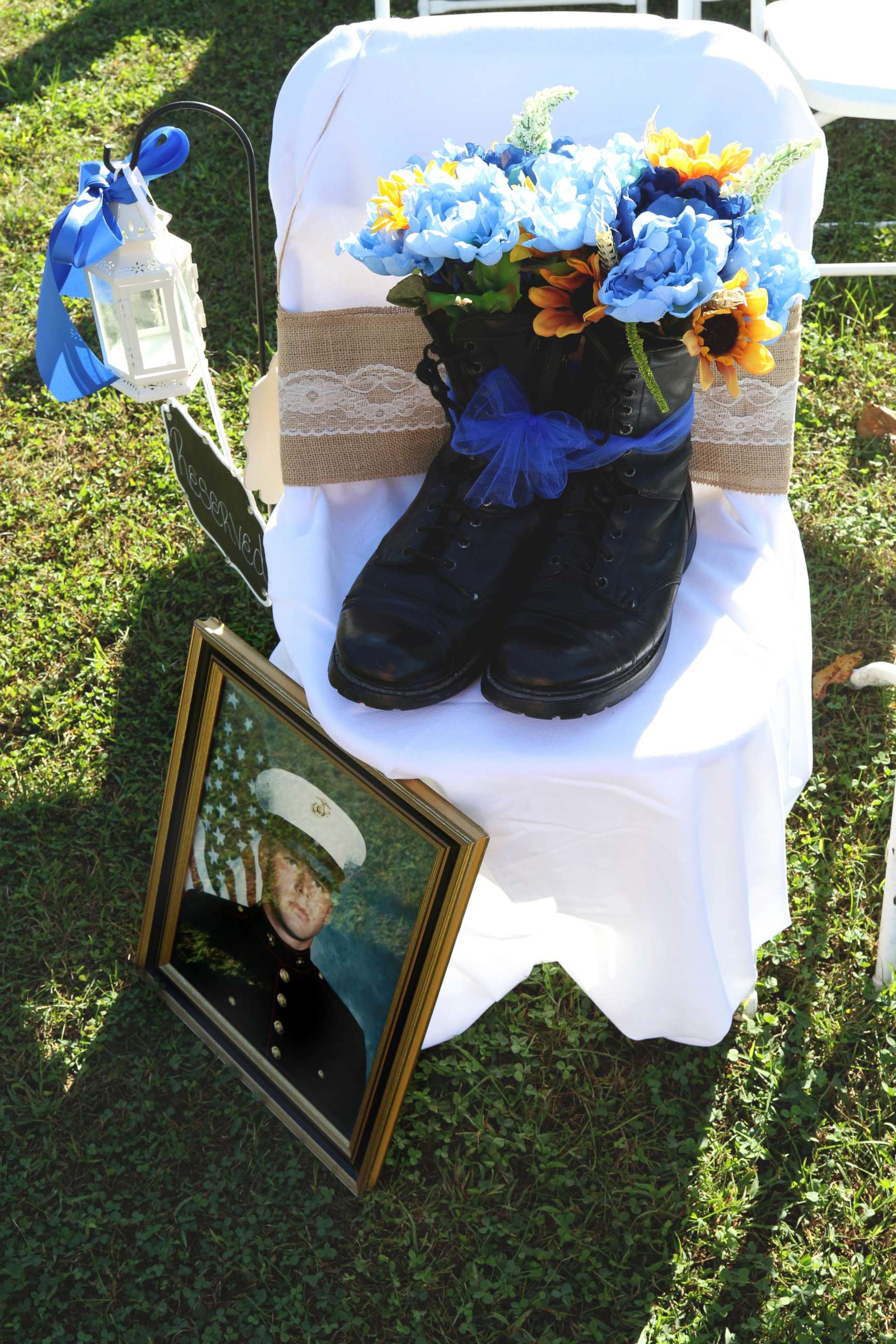 PHOTO: David Poling's Marine portrait and boots sat in the seat "where he would have been," said the bride.