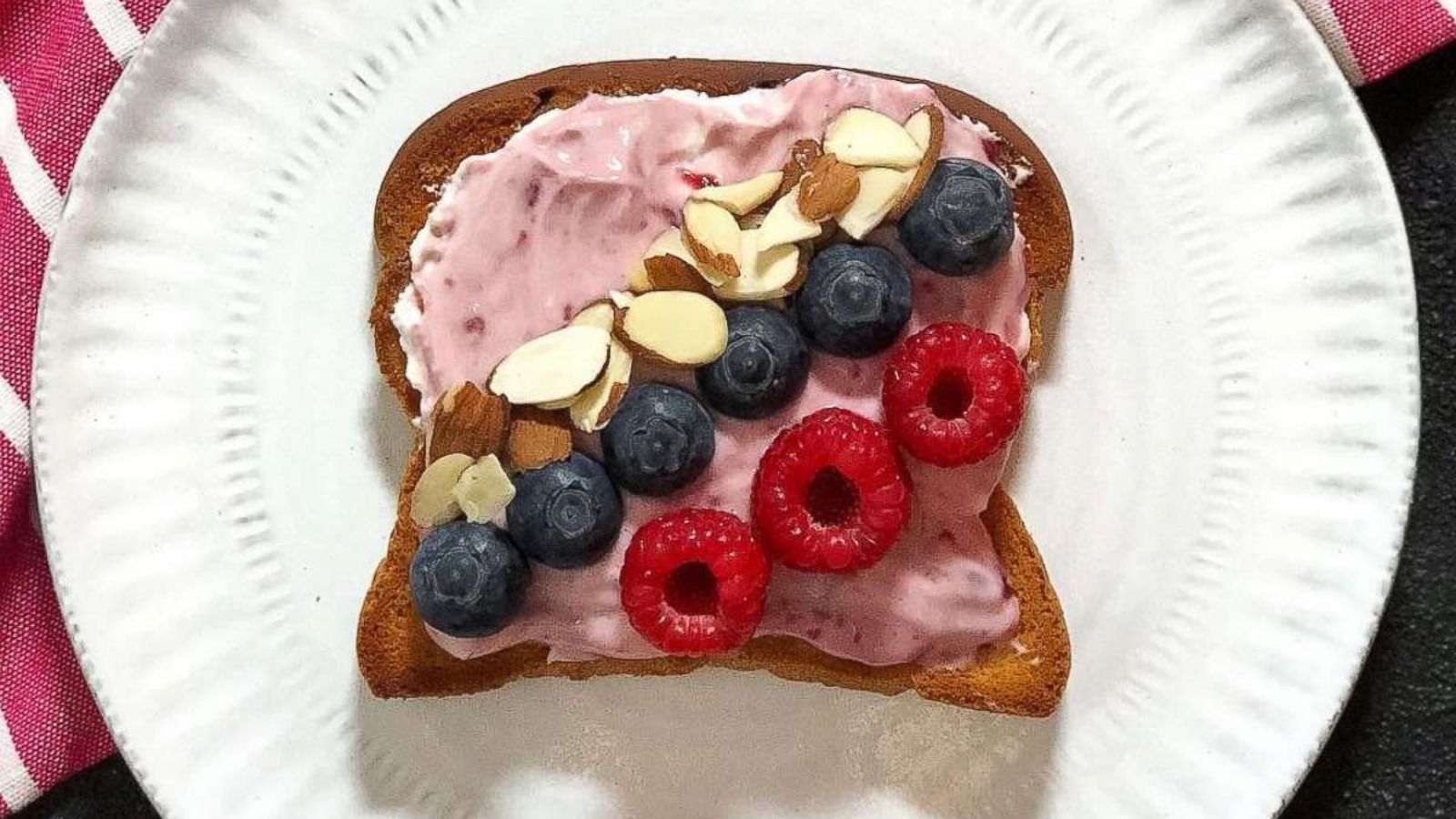PHOTO:Anna Brown who posts her healthy eats on @nutritionsqueezed came up with "millennial pink toast" made of Greek yogurt mixed with strawberry jam and topped with almond silvers, blueberries and raspberries.