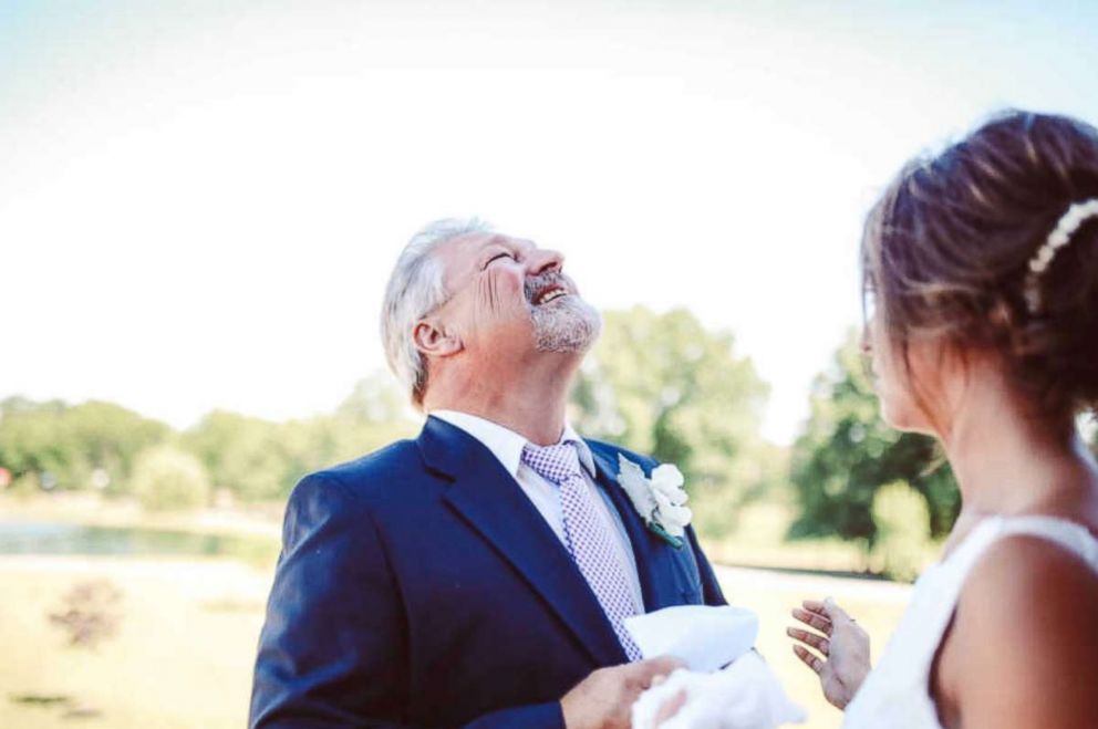 PHOTO: Rick, who asked ABC News not to use his last name, is holding back tears while looking at his daughter Morgan Gompf on her wedding day, June 25, 2016.
