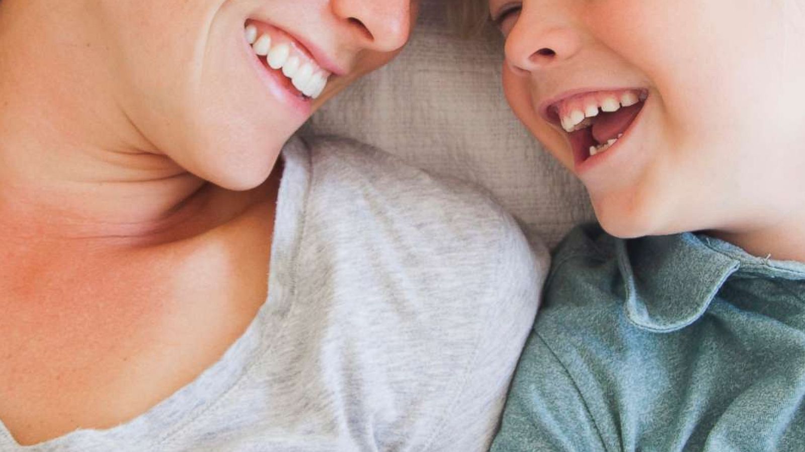 PHOTO: A portrait of a mother laughing with her son in this undated stock photo.