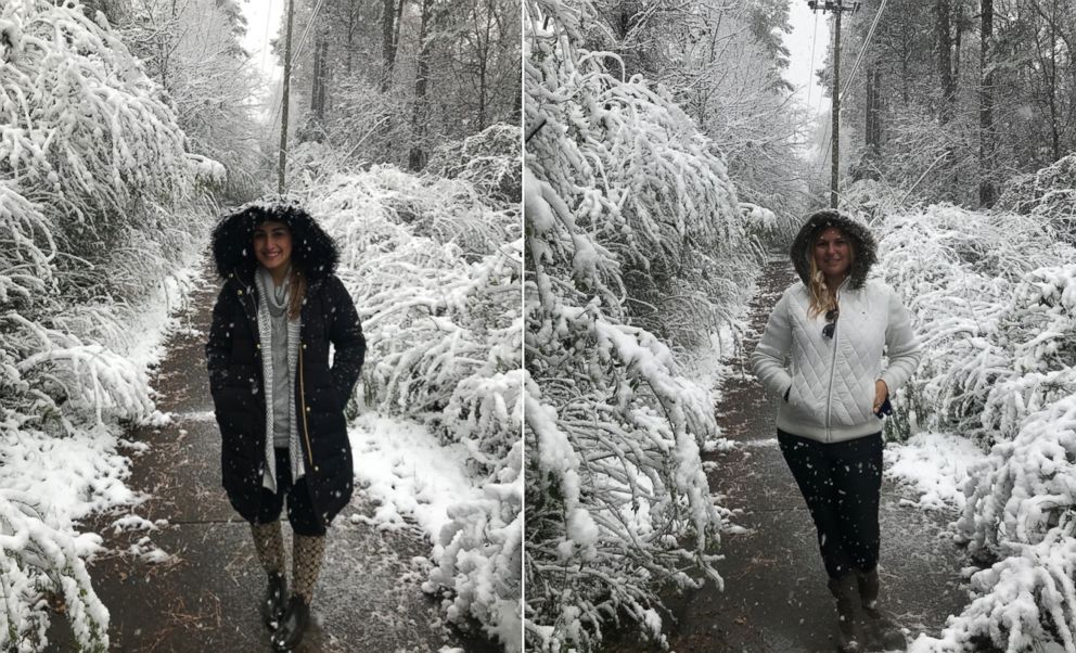 PHOTO: Natasha Bates and Christi Boston Henderson pose for photos on a rare day of snow last Friday in Vestavia Hills, Ala.