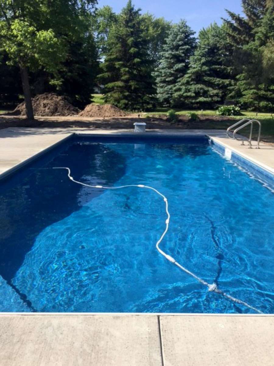PHOTO: Keith Davison's finished pool created by Custom Pools complete with a diving board.