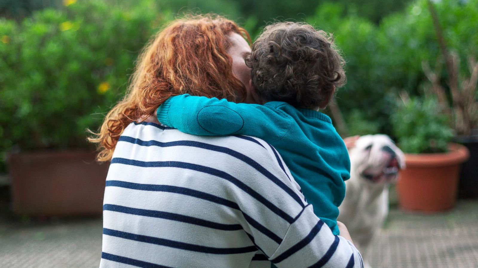 PHOTO: A mom holds her son.