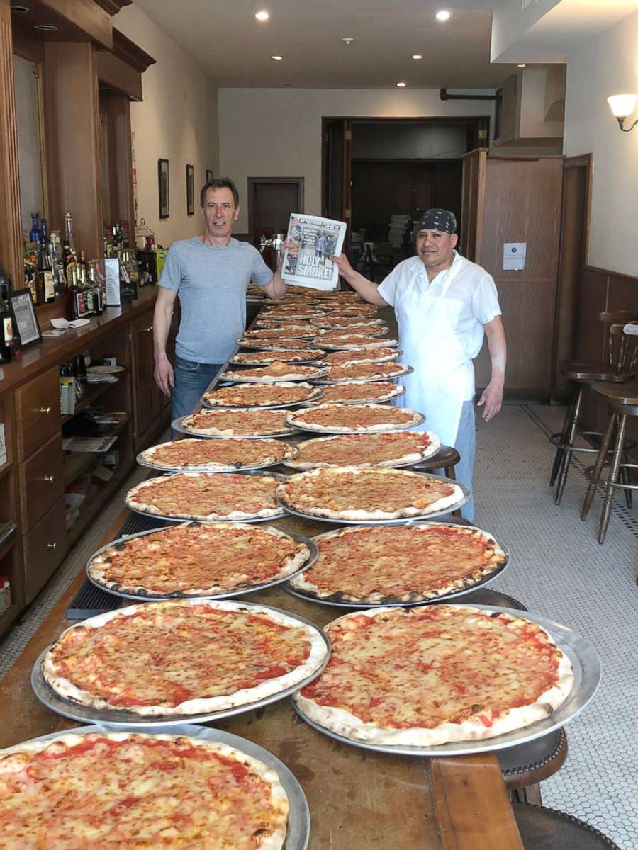 PHOTO: Frank Brija at Patsys Pizzeria in East Harlem with hundreds of pizza ready for delivery to Los Angeles.