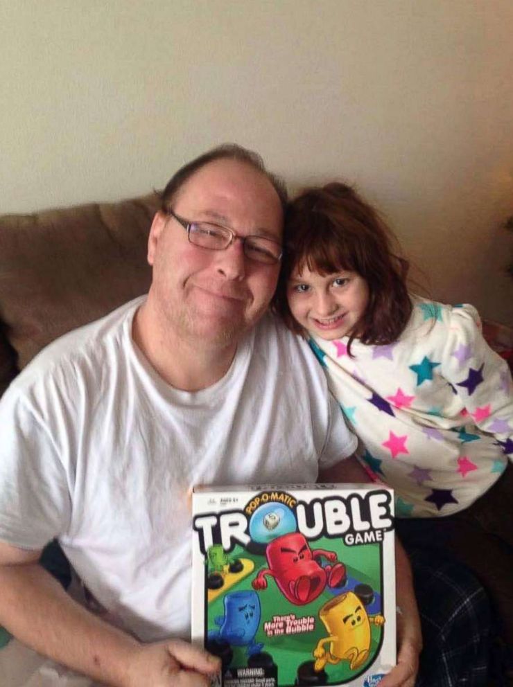 PHOTO: Seen in this undated photo, Philip Pieri, 47, of American Fork, Utah, sits with his daughter, Isabella Pieri, 11.