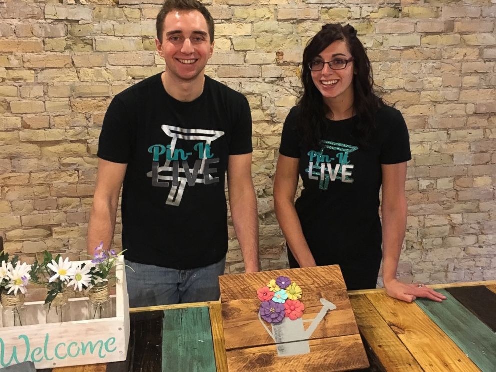 PHOTO: Pin-It Live co-owners Garrett Sheskey and Katie Garcia pose in the Milwaukee studio.