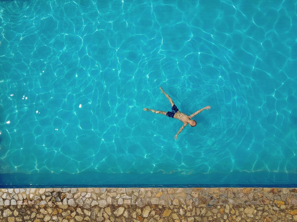 PHOTO: A child swims in a pool in this undated stock photo.