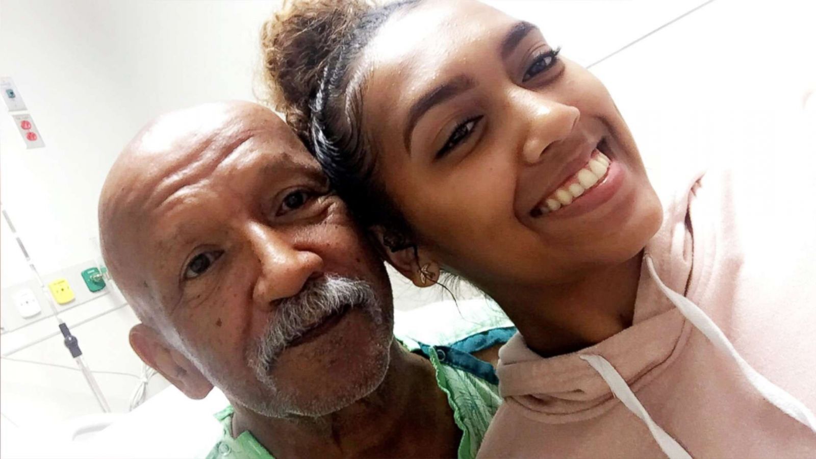 PHOTO: Sianni Tirado with her grandfather, David.