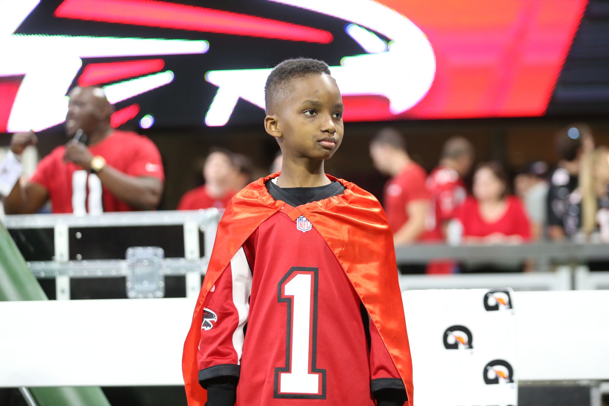 PHOTO: Kaleb, who is a patient at Children's Healthcare, wears a Falcons Atlanta red cape to show off his superhero strength. 