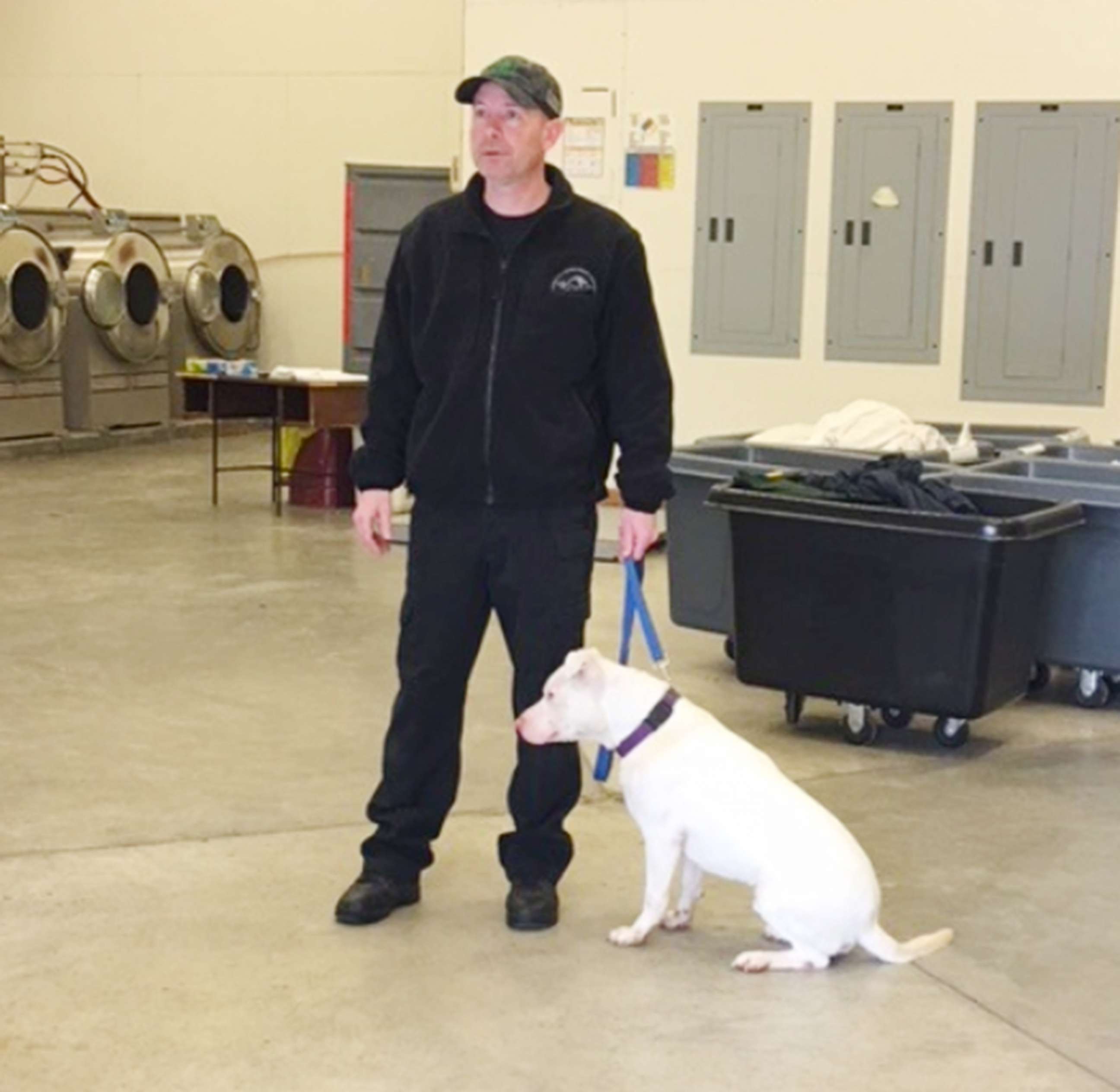 PHOTO: Ghost works alongside Joe Henderson, a K-9 handler for almost 10 years.