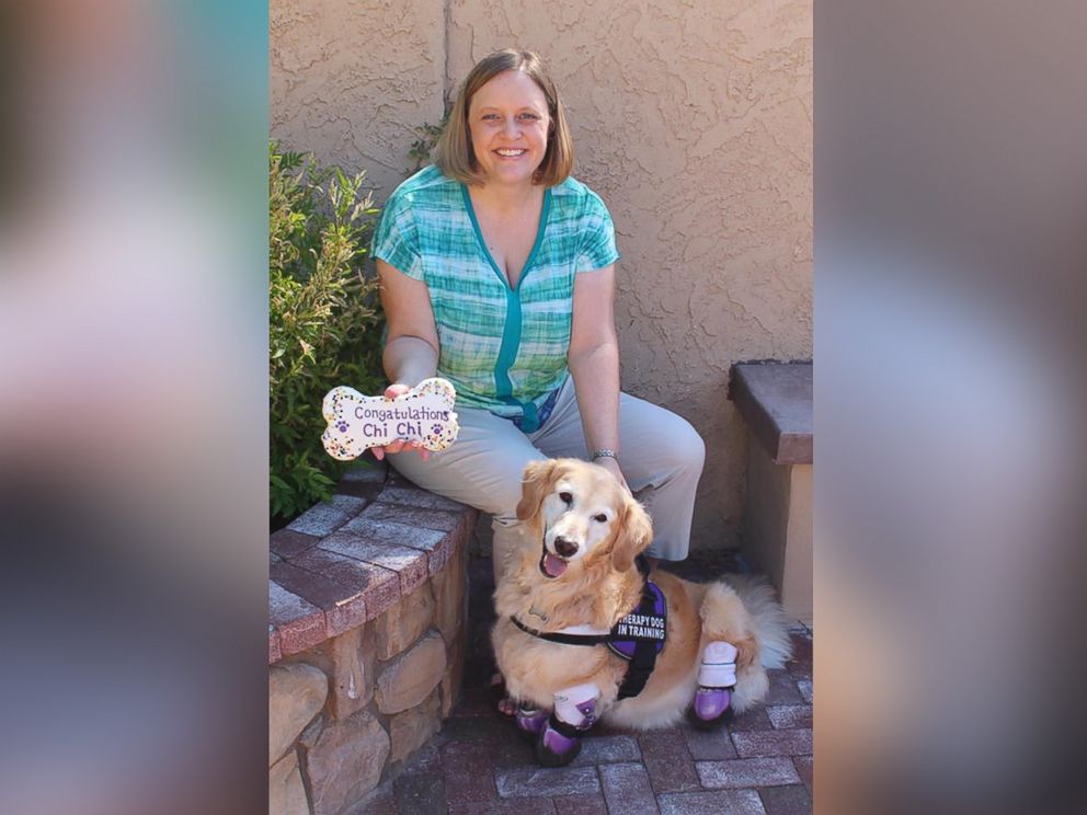 PHOTO: Elizabeth Howell, of Phoenix, Arizona, poses with her familys dog, Chi Chi.