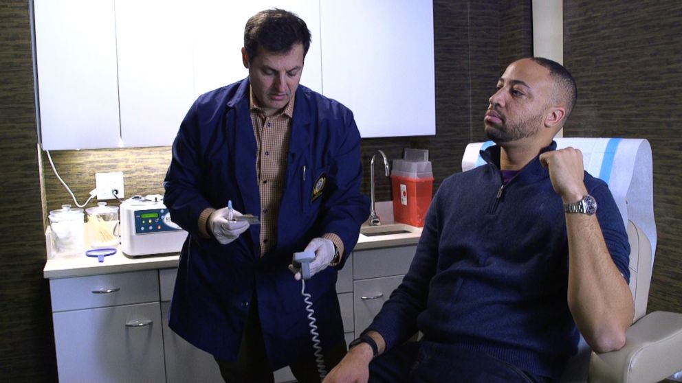 PHOTO: JDr. Norman Rowe, a New York City plastic surgeon, injects a male patient with platelet-rich plasma on a recent visit. 