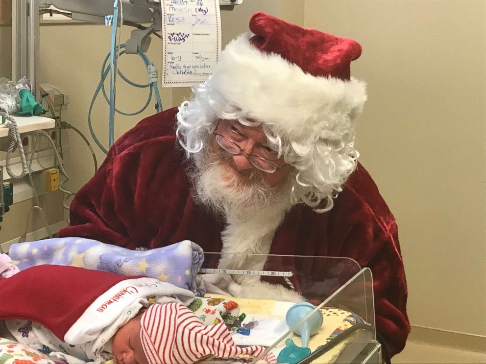 PHOTO: A baby at St. David's Women's Center of Texas in Austin is visited by Santa Claus.
