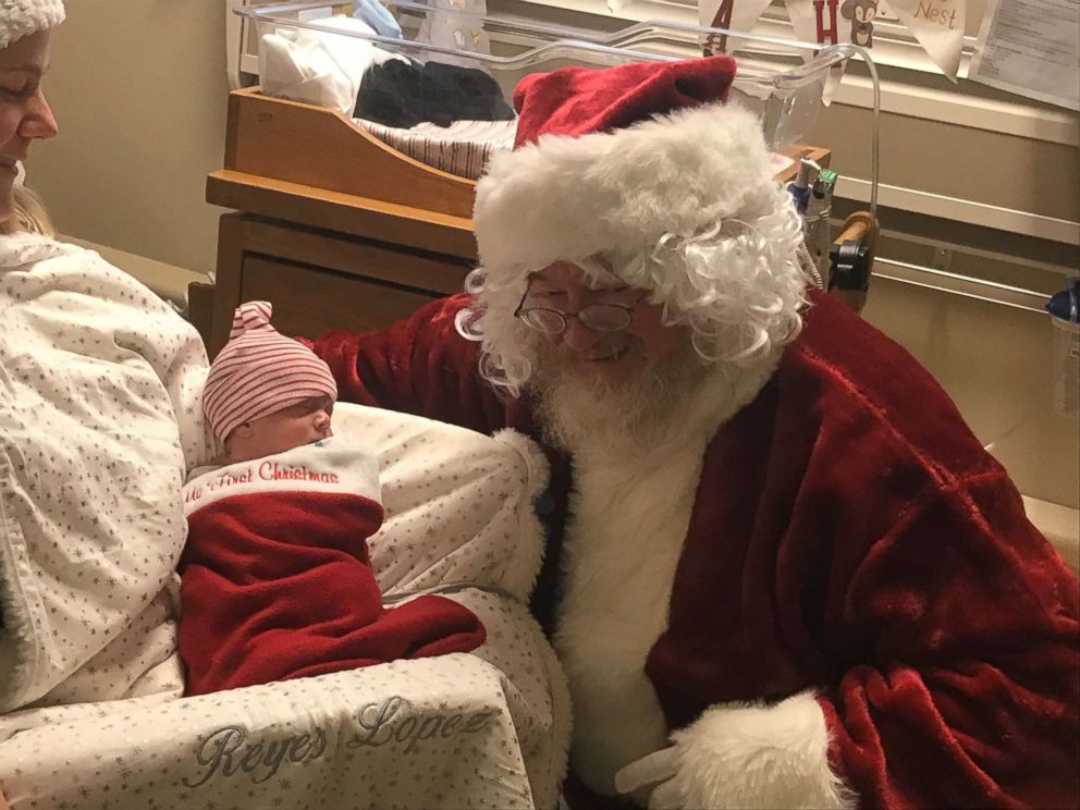 PHOTO: Santa Claus visits with a baby and mom at St. David's Women's Center of Texas in Austin.