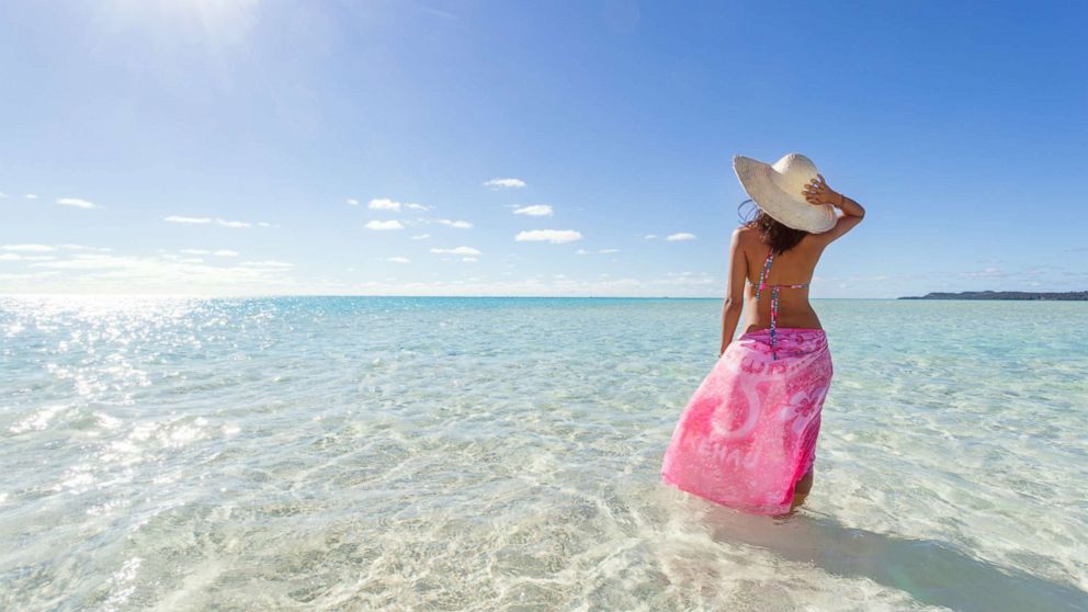 PHOTO: A woman wears a sarong on a beach in an undated stock photo.