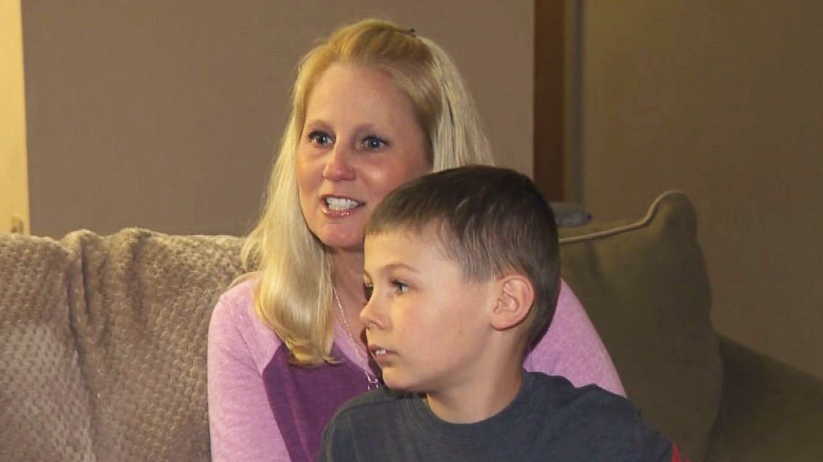 PHOTO: Tammy Aikins, 44, a mother of two from Monroeville, Pa., holds her son, Tyler, 8, during an interview.