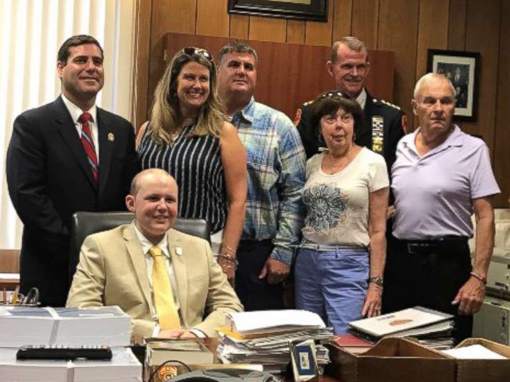 PHOTO: Sean Dixon seen with his parents, Kim and Scott Dixon, grandparents and police commissioner Tim Sini on August 1, 2017. 