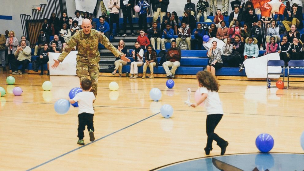 PHOTO: Army Specialist Seth Howard surprised his twins, Riley and Liam Howard at their school, Gahanna Christian Academy.