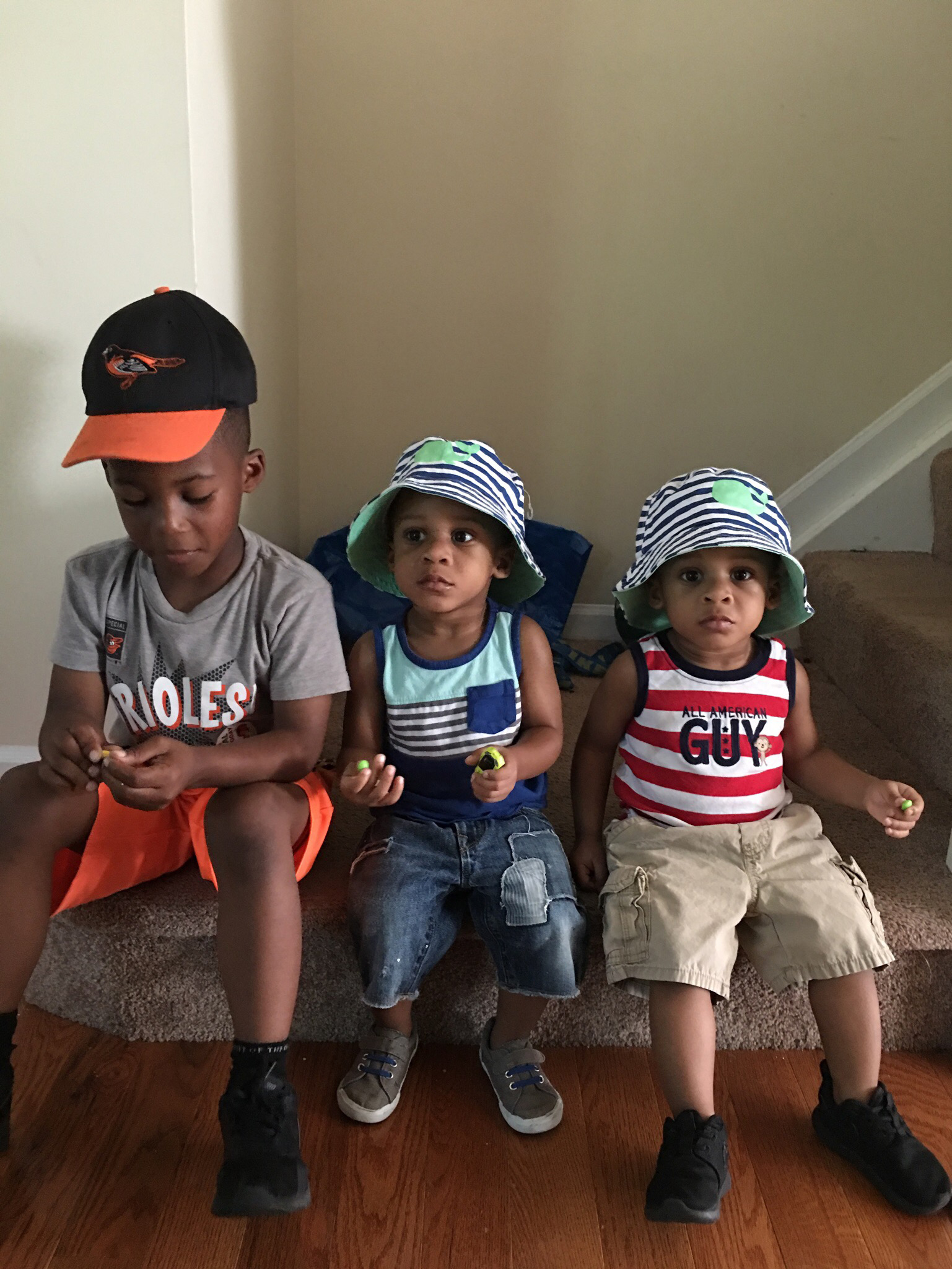 PHOTO: Shai Tolbert, 6, with his little brothers, 2-year-old twins Riley and Alexander.