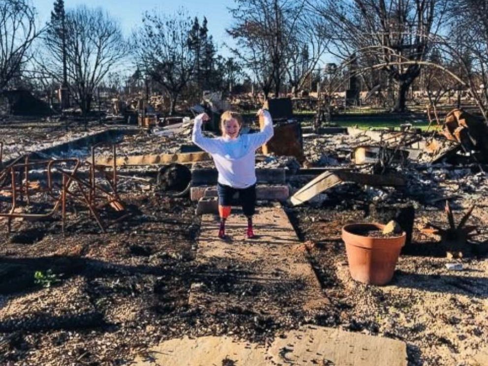 PHOTO: Lily Biagini, 10, stands on the remains of her familys home in Santa Rosa, Calif.