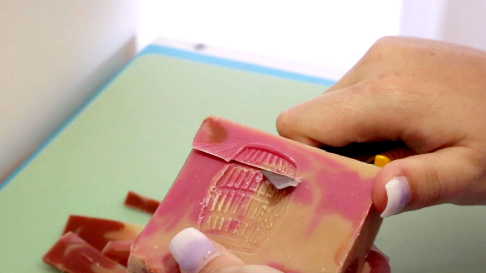 PHOTO: Kaelin Brady cuts up bars of soap for her thousands of Instagram followers from her home in Frederick, Maryland.