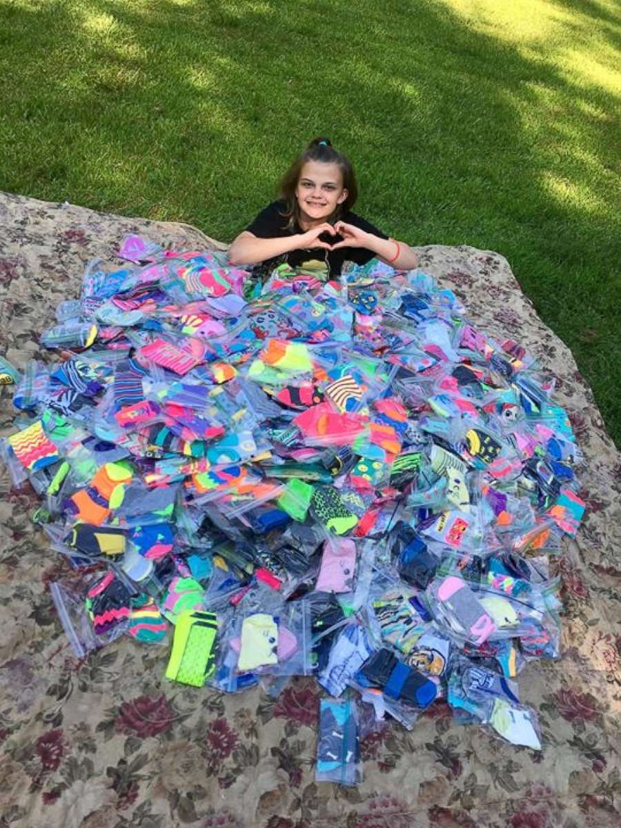 PHOTO: Emma Becker, 12 of Higganum, Connecticut, has collected thousands of pairs of silly socks for her fellow patients at Connecticut Children's Medical Center in Hartford, Connecticut.