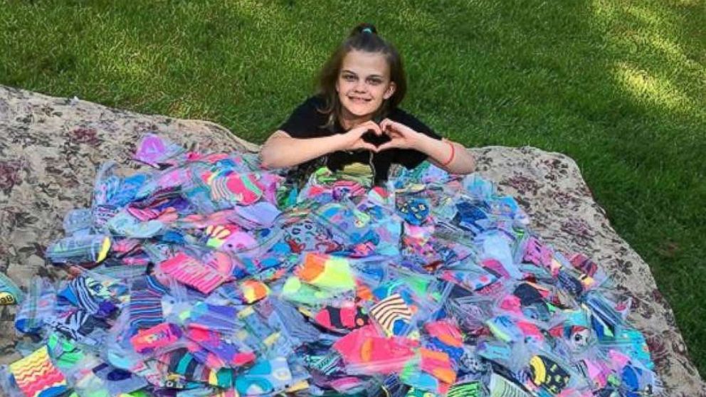Emma Becker, 12, has collected thousands of pairs of socks for her friends at Connecticut Children's Medical Center.