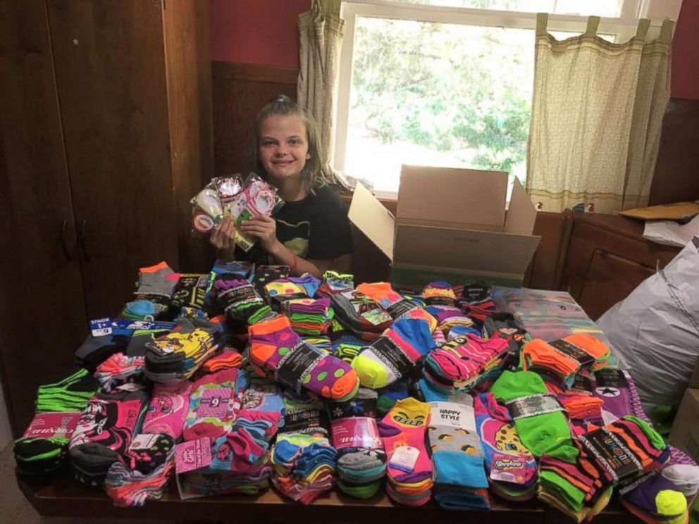 PHOTO: Emma Becker, 12 of Higganum, Connecticut, has collected thousands of pairs of silly socks for her fellow patients at Connecticut Children's Medical Center in Hartford, Connecticut.
