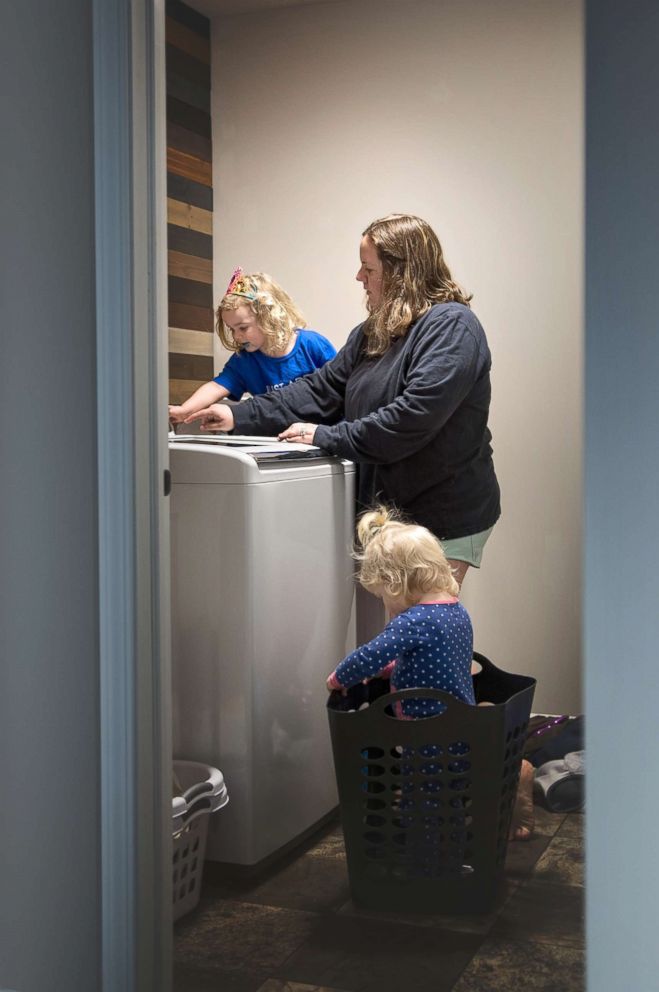 PHOTO: Photo series on stay-at-home moms show the reality of what it's like to play this role.