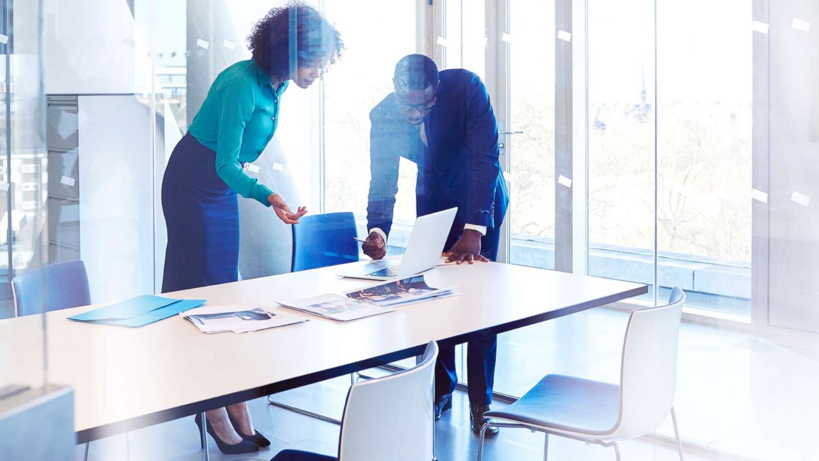 PHOTO: Stock photo of a man and a woman at work in an office.