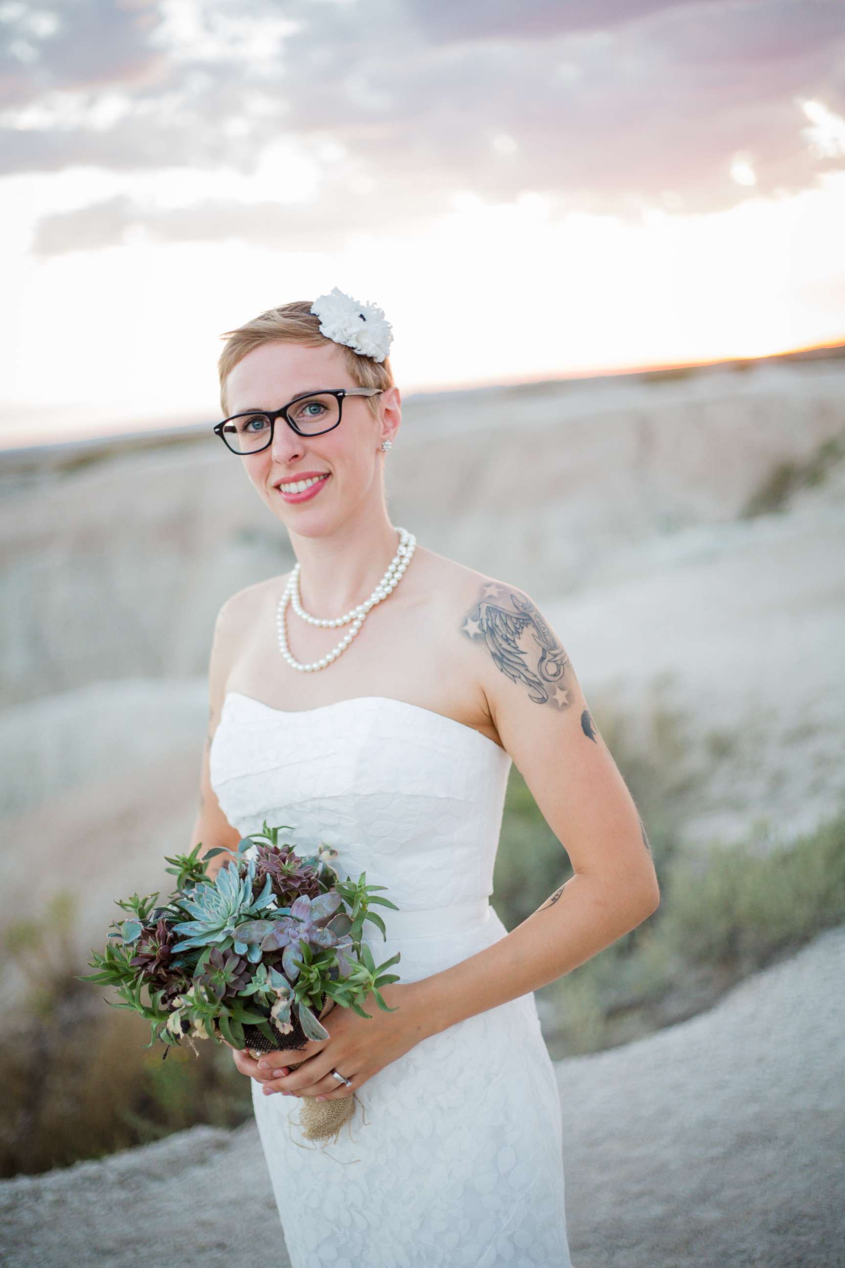 PHOTO: A bride holds a bouquet of succulents while standing in Badlands National Park in South Dakota in an undated stock photo.