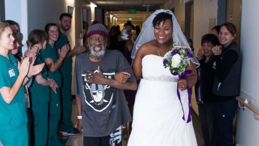 PHOTO: Preston Rolan, who is battling leukemia at UCSF Medical Center in San Francisco, walks his daughter, Vieneese Stanton, down the hospital's hallways on her wedding day.