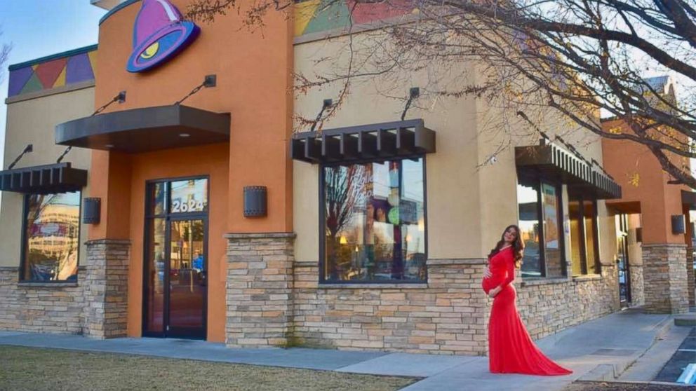 Kristin Johnston took her maternity photos in front of her local Taco Bell in Atlanta, Georgia.