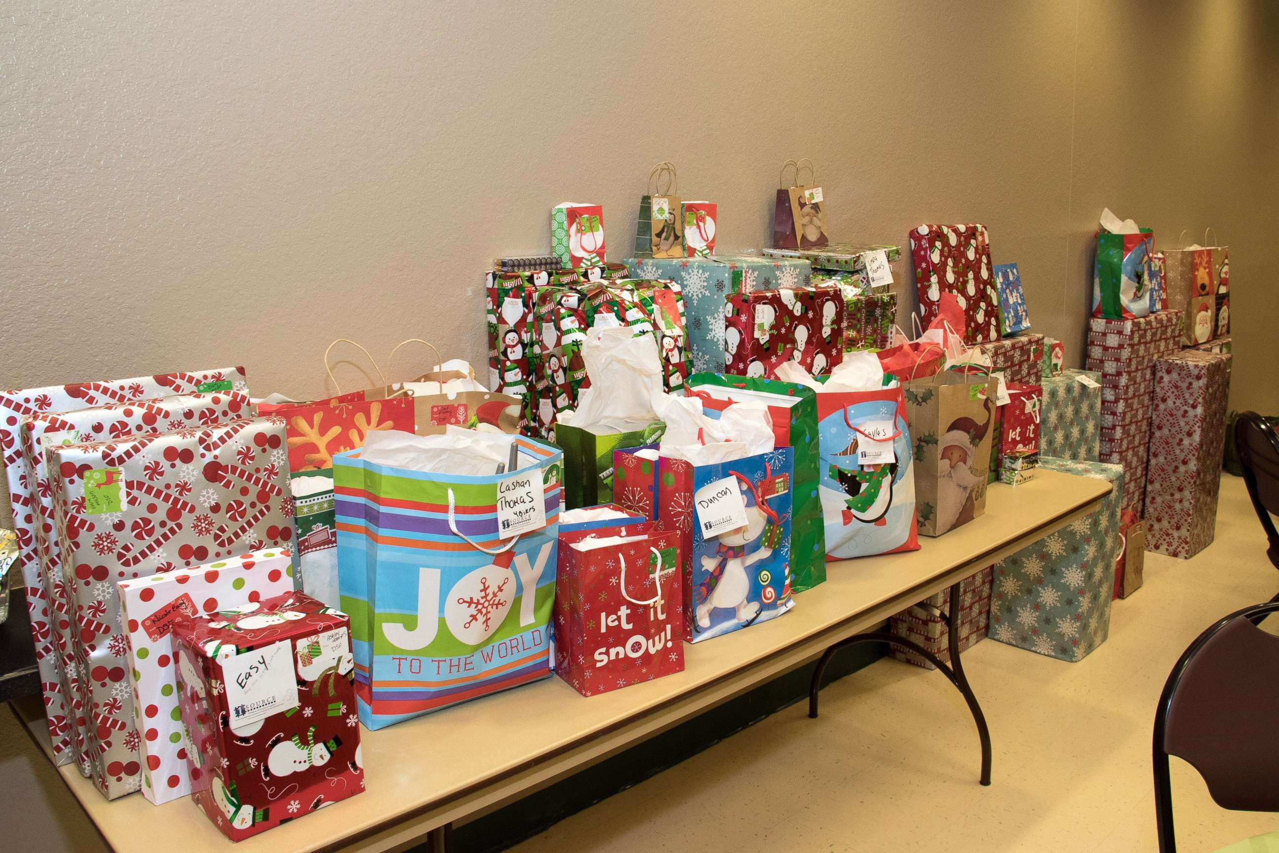 PHOTO: Presents lined up on the table for children to receive for Christmas at the charity event Carolynn Smith hosted two years ago in Tampa.