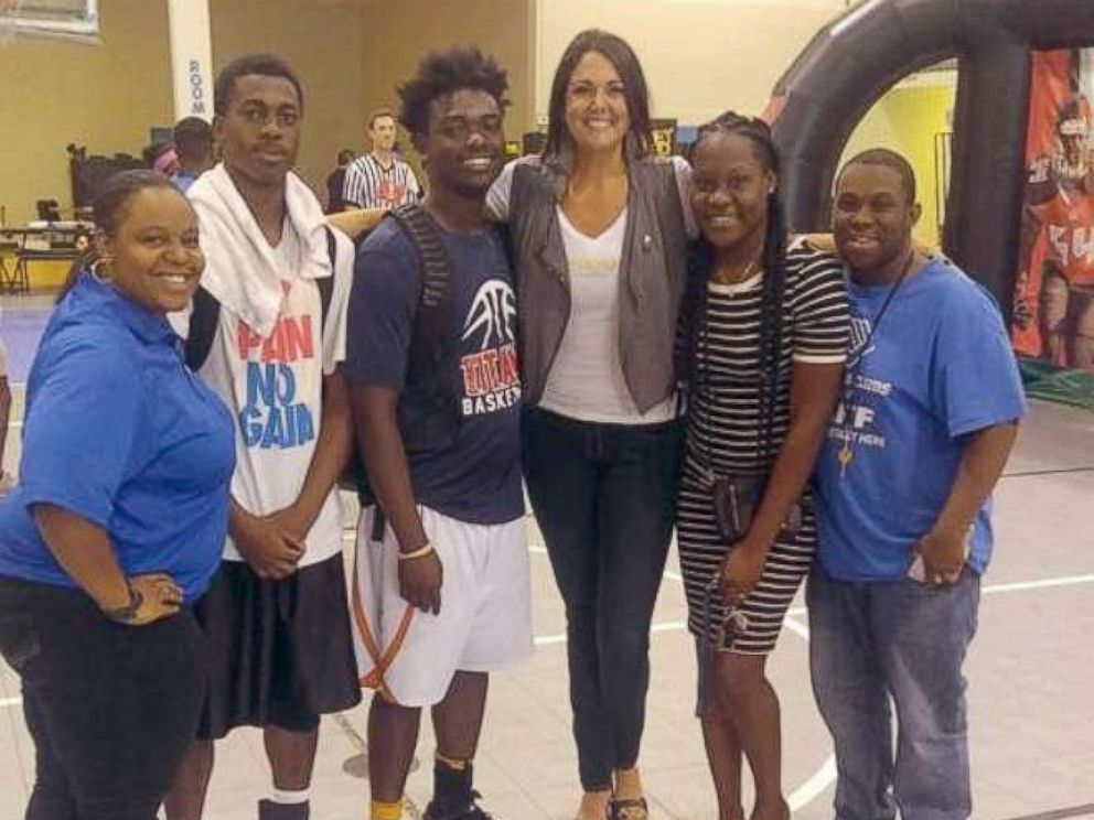 PHOTO: Carolynn Smith of Tampa poses with her mentees from the Boys and Girls Club.